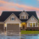 A house with wet pavement around it